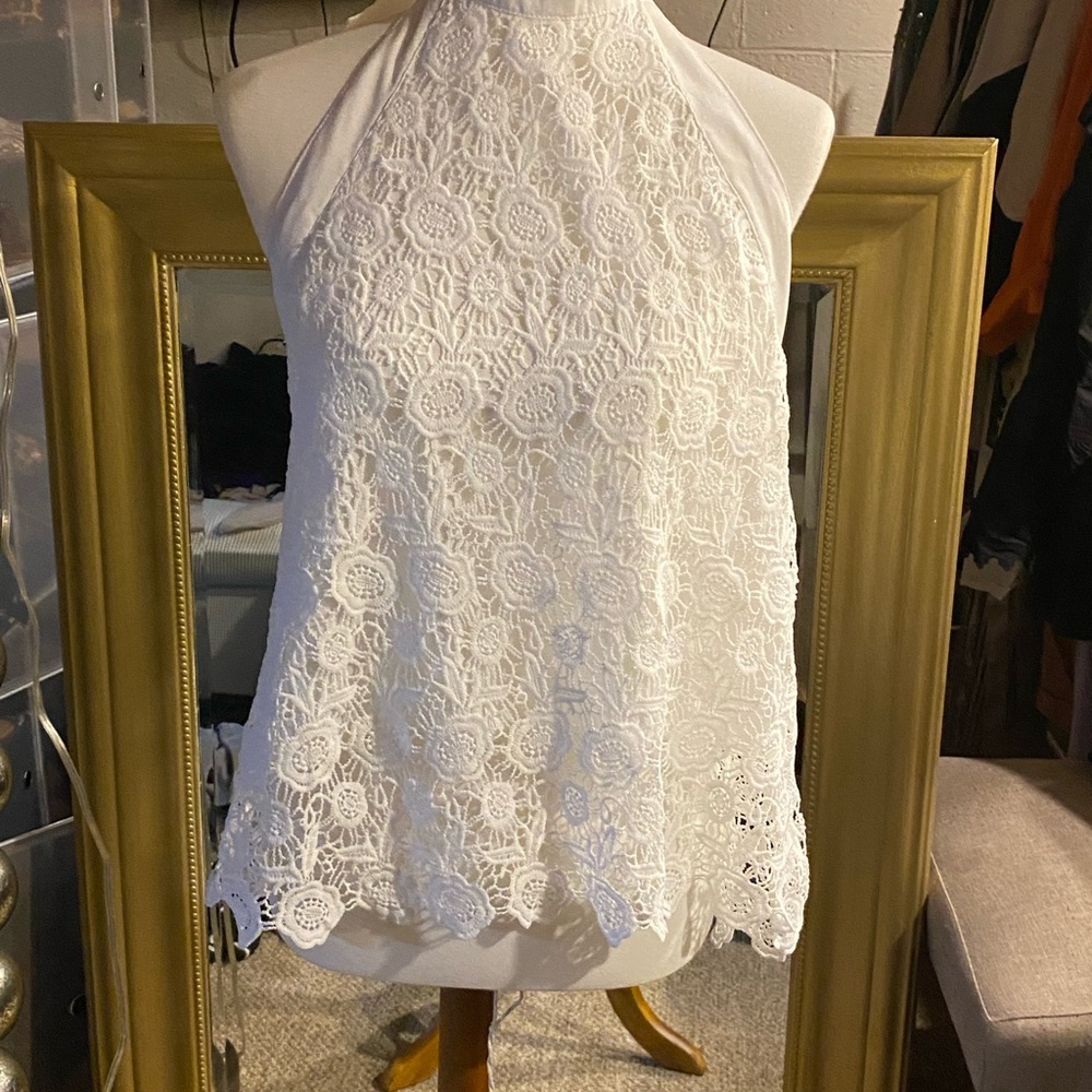 Beautiful white open back floral shirt. Beautiful for a white party.
